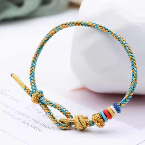 Buddhist Lucky Knot Bracelet - Turquoise and Gold Braided Design - Image 2